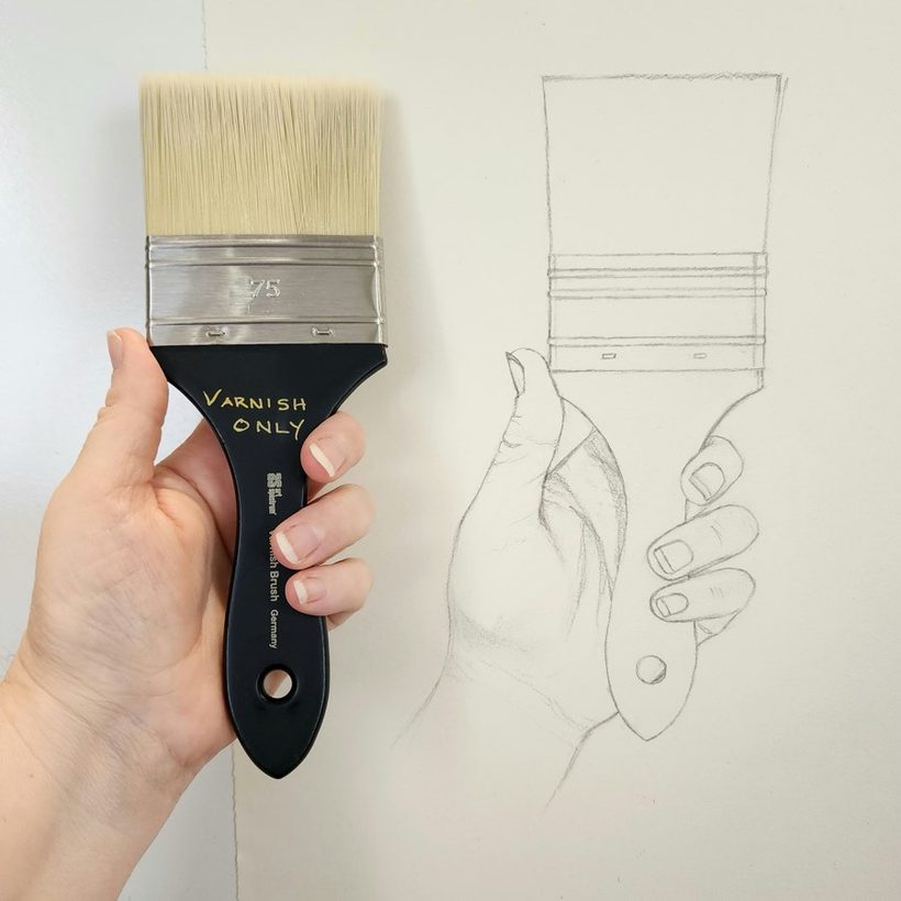 A pencil contour drawing of a hand holding a paintbrush, the first project in the challenge